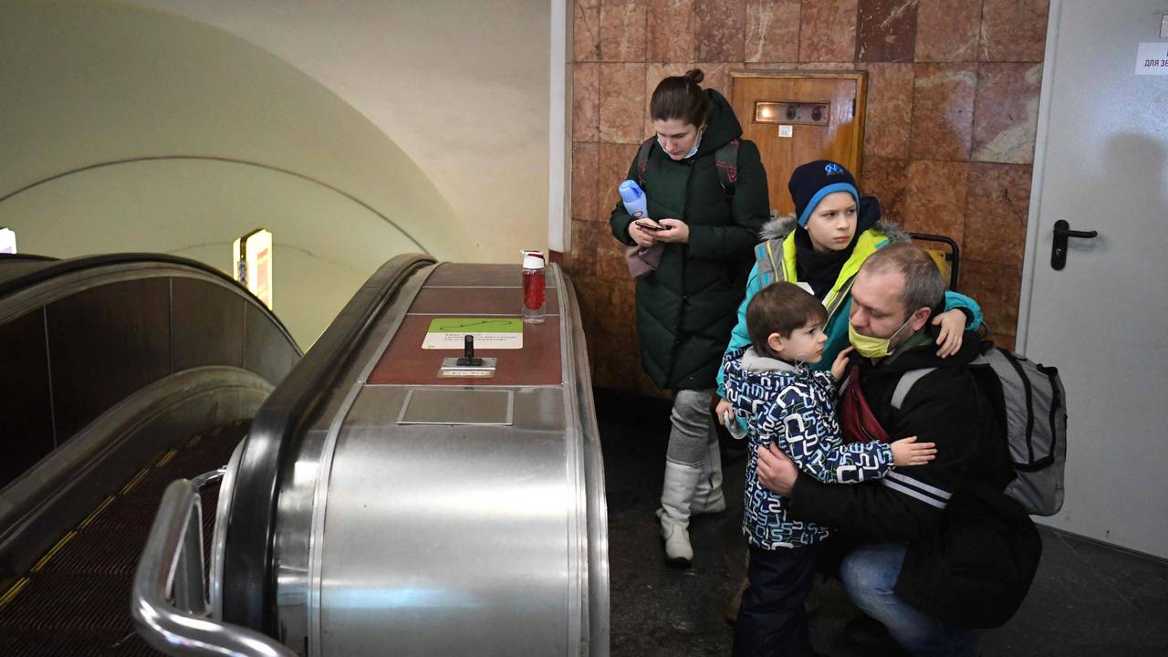 The plane alarm went off several times Thursday morning in the Ukrainian capital, Kiev.  Here, a family sought cover at one of the Kiev metro stations.