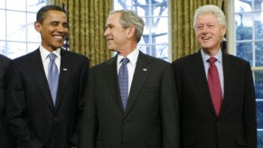 Warlords: Park Obama, George W. Bush.  Bush and Bill Clinton have led the United States and NATO through wars that have provoked the Russians.  Photo: KEVIN LAMARQUE