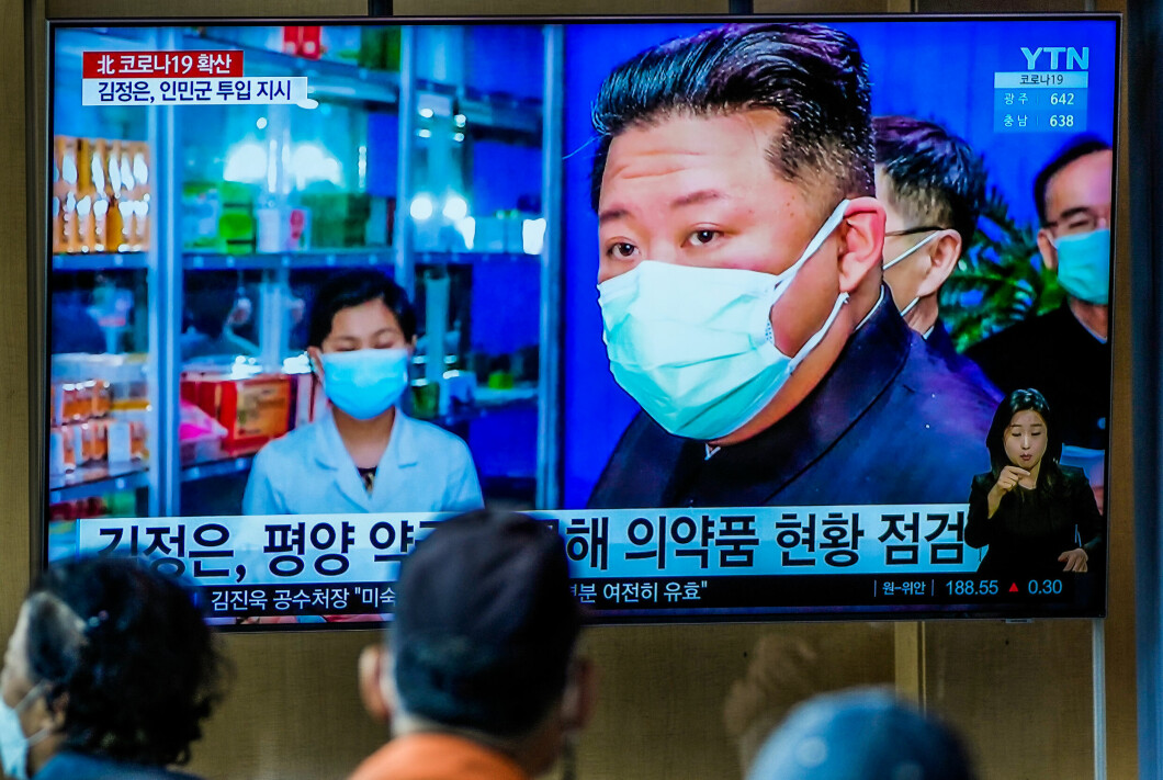 On TV: People in South Korea follow the situation in North Korea at a train station in Seoul.  Photo: Lee Jin-man / AB