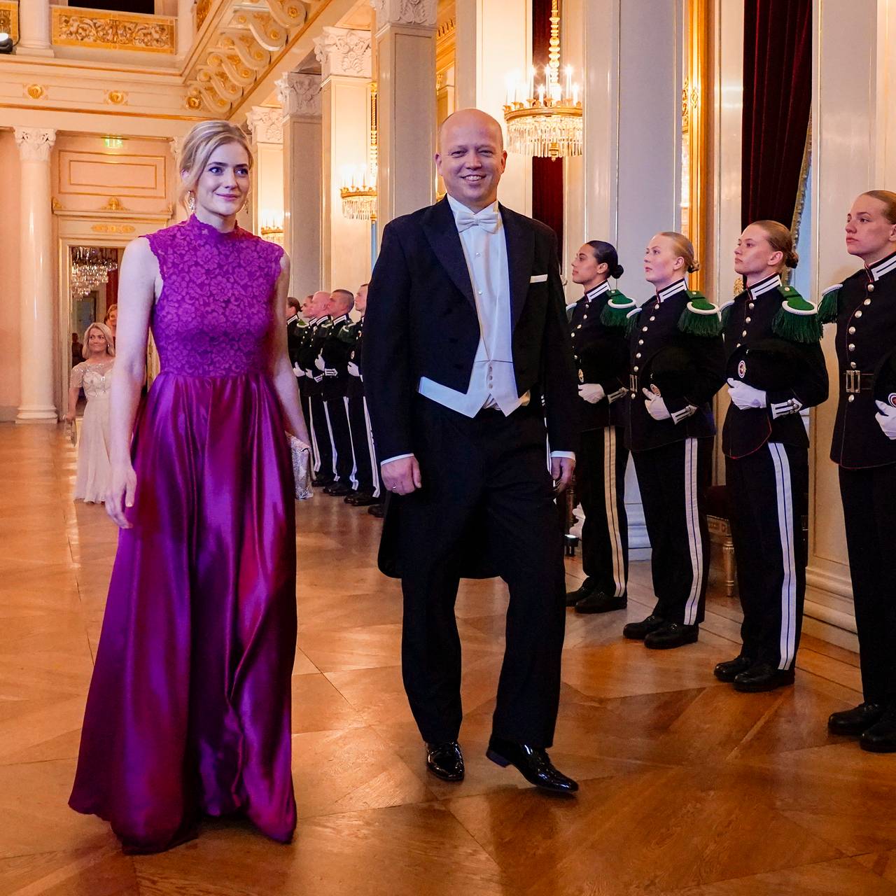     Emilie Enger Mehl and Trygve Vedum Slagsvold go in a parade through the large banquet hall for the gala dinner 