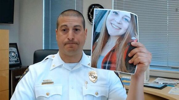 Powerful responses: Illinois Police Chief Marcus Pulido displays a photo of Lizzie Dodd at a press conference posted on Facebook after the murder.  Photo: screenshot