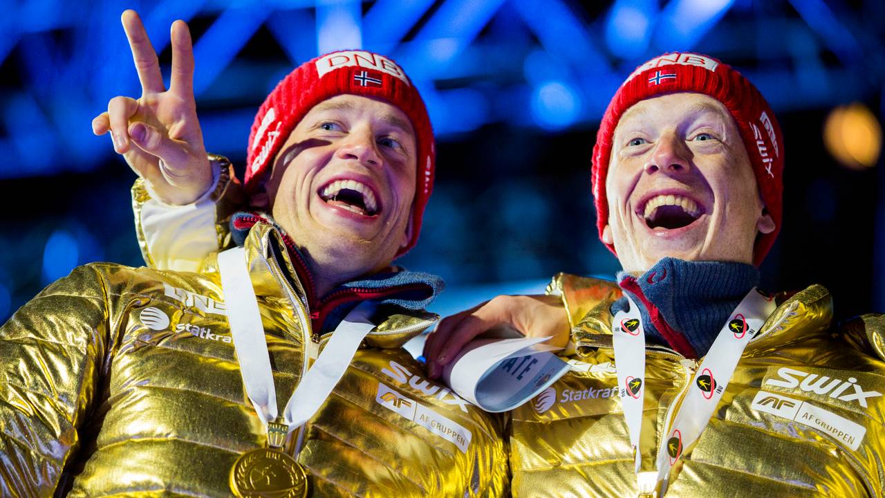 Johannes Thingnes Boe and Tarjee Boe (left) with the gold medal after the medal ceremony for the men's 4 x 7.5 km relay at University Square in Oslo on Saturday night.