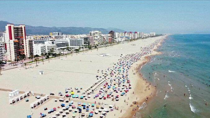 BEACH LIFE: Gandia Beach south of Valencia is one of the beaches that uses new drone technology.  Photo: Reuters