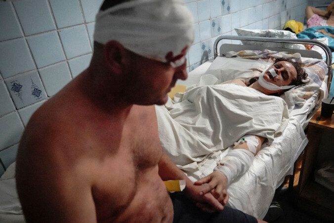 Wounded: A couple injured in Monday's attack are in a city hospital.  Photo: Reuters / Anna Voitenko