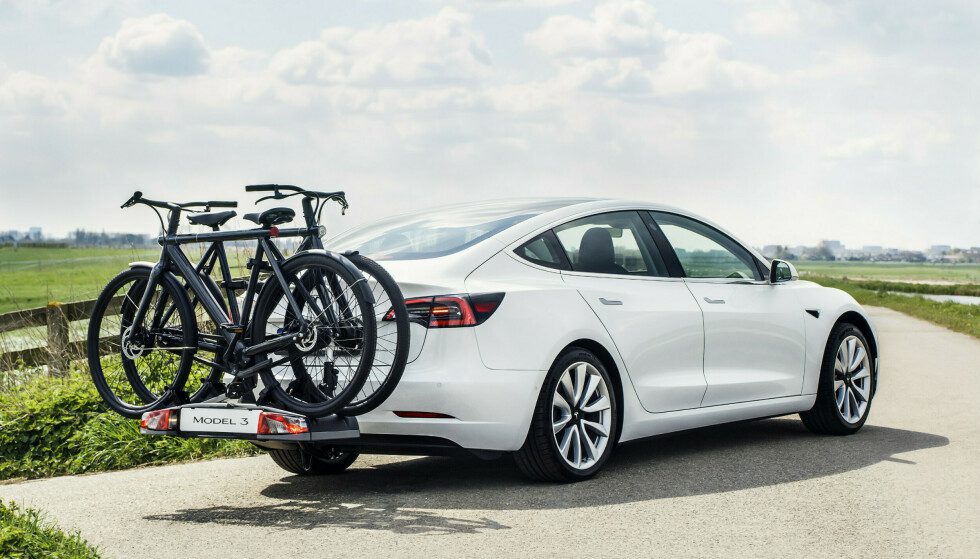 You lose less range if you put the bikes in the back of the car instead of on the roof.  Photo: Tesla.