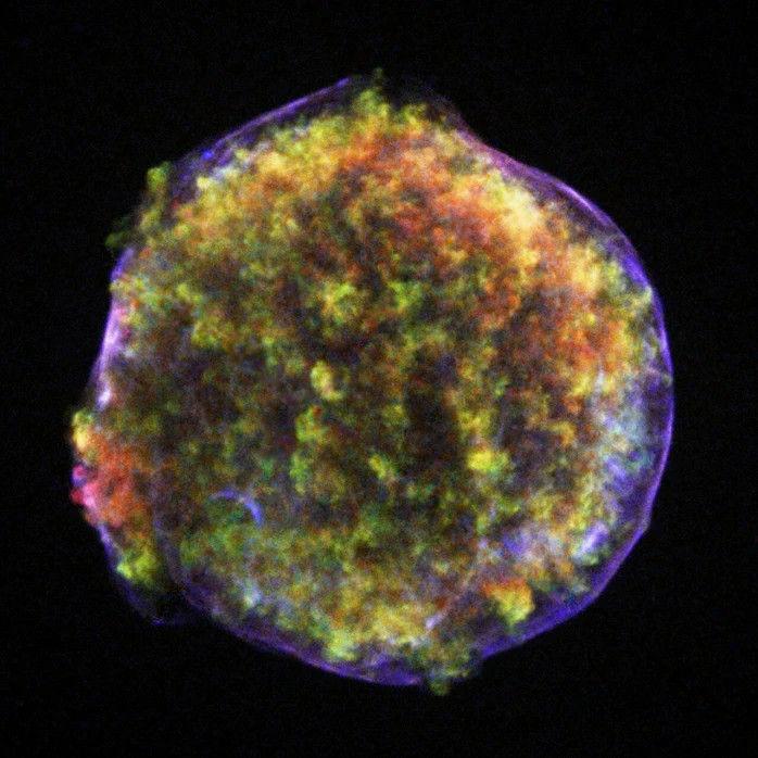This is the so-called SNR (supernova remnant) seen in X-rays, the material left over after a supernova explosion.  Within such an SNR, a neutron star can be found.  This particular SNR is called Tychos nova.  (Illustration: NASA/CXC/Rutgers/J.Warren & J.Hughes et al.)
